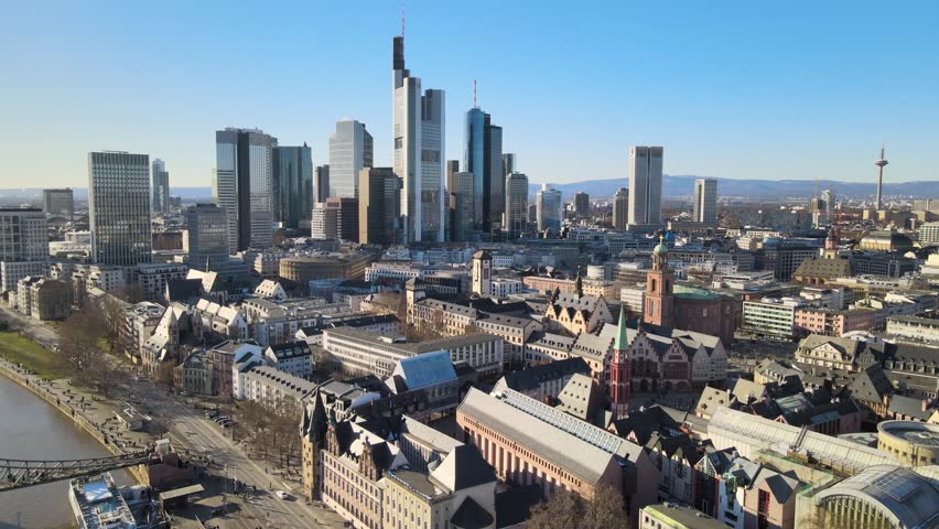 Aerial view of the modern skyscrapers and historic architecture of the city skyline in Frankfurt am Main, Hessen, Germany.