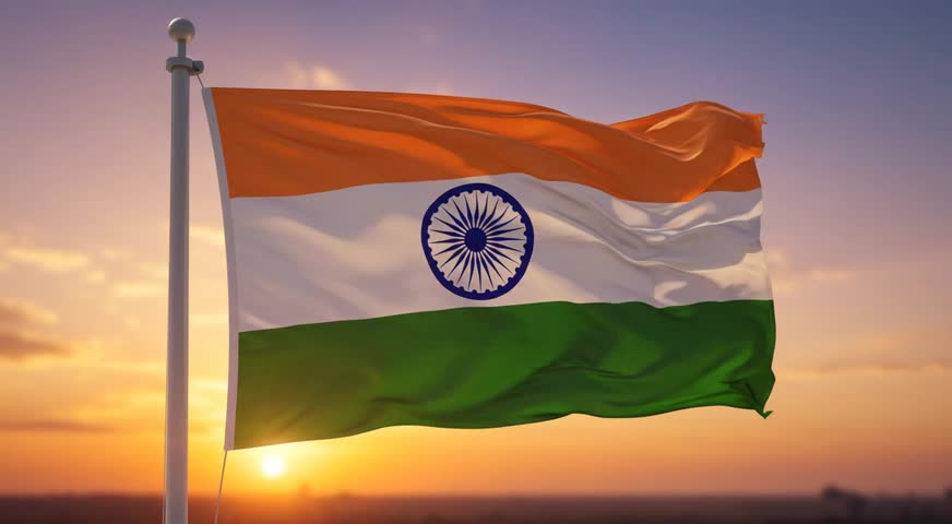 An AI-generated illustration of the Indian flag waving at sunset with orange sky and the Ashoka Chakra clearly visible