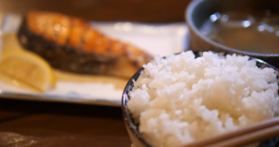 Close up of Japanese Grilled Salmon Teriyaki with rice and miso soup