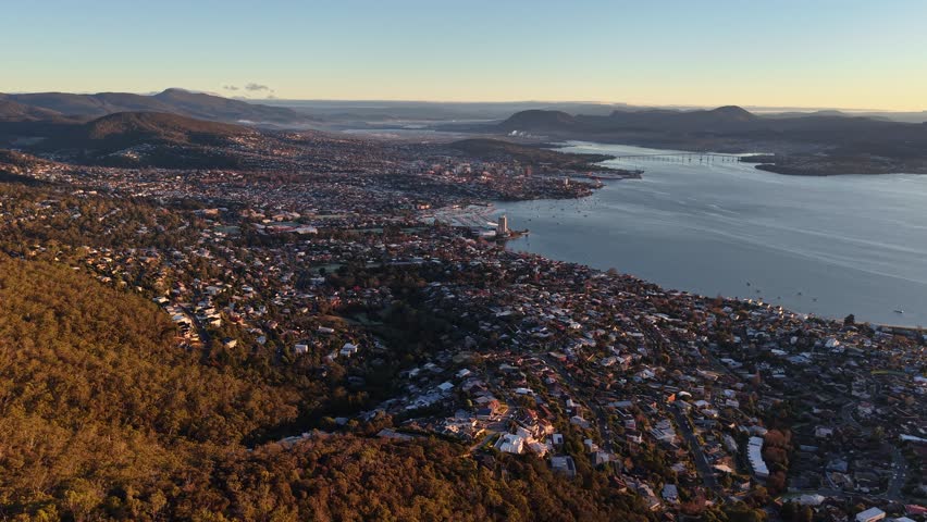 Aerial drone footage from Mount Nelson Lookout overlooking Hobart, Mount Wellington and the Derwent River, Tasmania, Australia