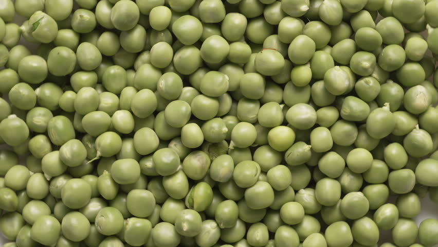 Vegan and healthy vegetable. Fresh green peas on isolated background. Green pea beans vegetables. Close-up. top view