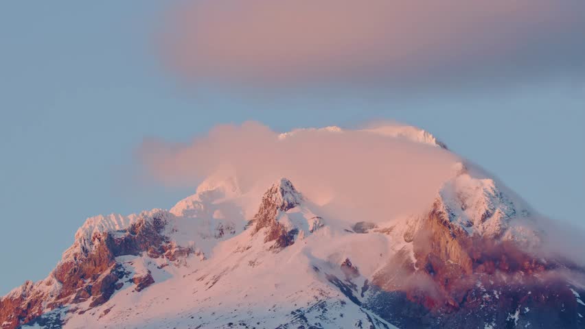 Close-Up View of Snow-Covered Mount Hood with Pink Clouds at Sunset
