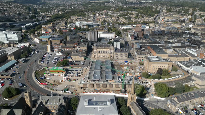 An aerial of central Halifax showing civic buildings and the Piece Hall amid redevelopment works