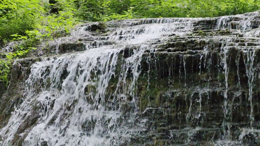 waterfall water flowing cascade cascading up close 