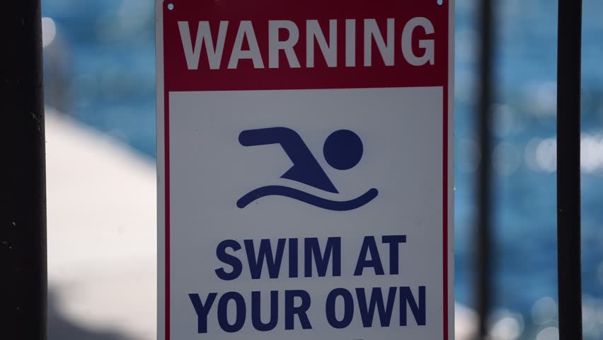 Warning Sign for Swimmers at Lake