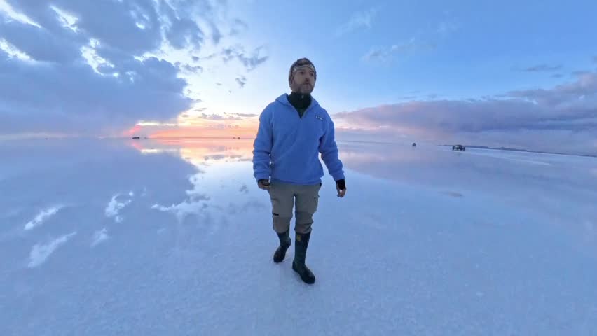 Exploring Salar de Uyuni Salt Flats Bolivia during Beautiful Sunset