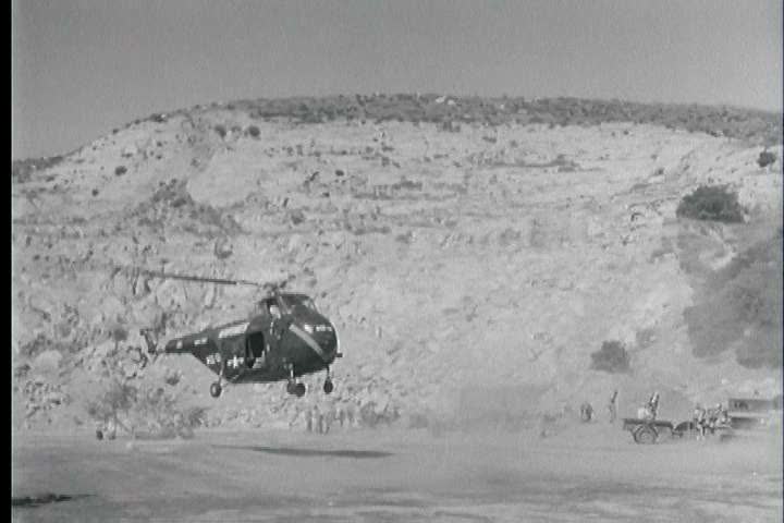 1950s - An officer lands at a camp and introduces himself to the men in the 1950s