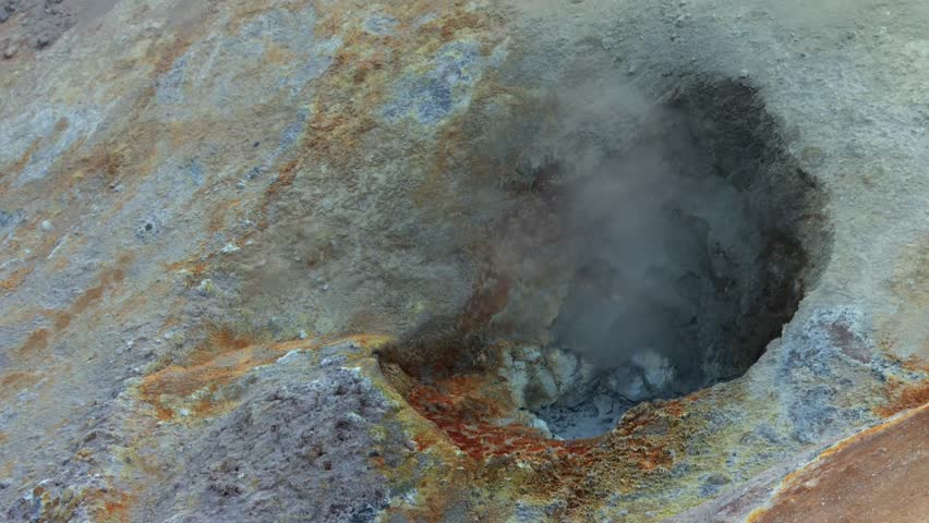 Static shot of steaming geothermal mud pot crater in Lassen Volcanic National Park, California, USA