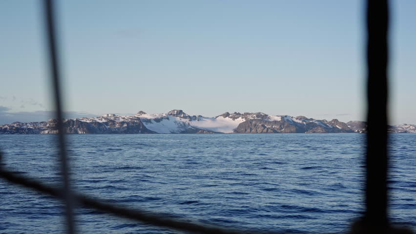 Antarctic Coast Seen Through Ship Rigging