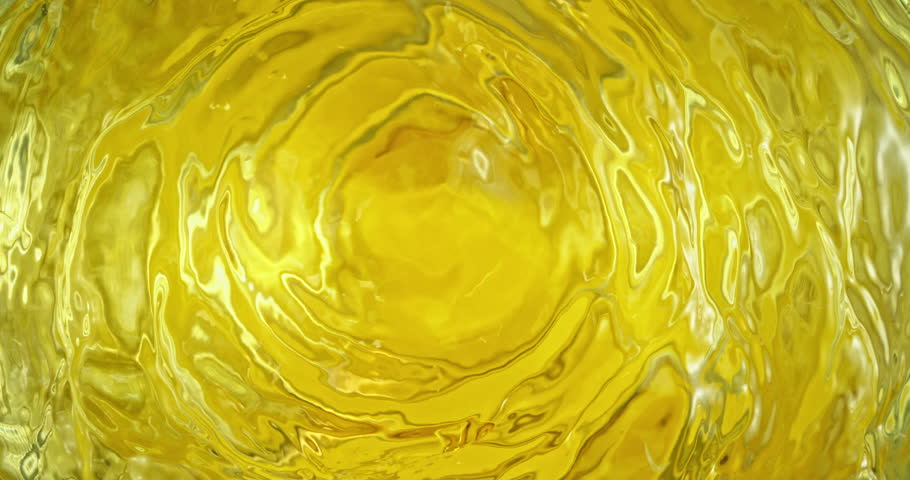 Super slow motion 1000fps video of fresh lemon slices falling into rippling water, creating a sparkling splash, perfect for drink, cocktail and summer visuals.