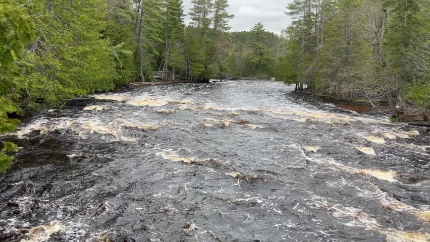 Cinematic shot of the rapids at Tahquamenon State Park ni upper Michigan