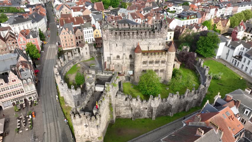 Aerial drone view of Ghent old town in Belgium, with the towers of St. Nicholas and St. Michael