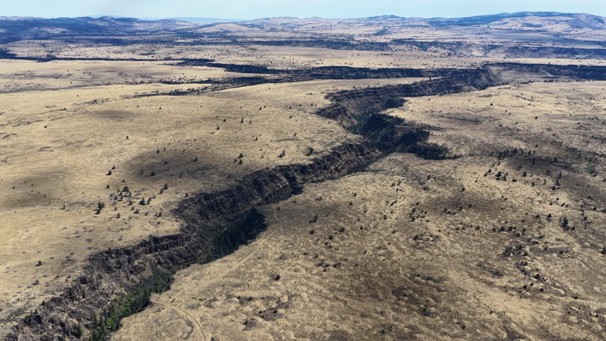 Over millennia Mill Creek has carved a 230-foot deep canyon on the Central Oregon plateau between Bend and Portland. This scenic area of high desert is part of the Warm Springs reservation.