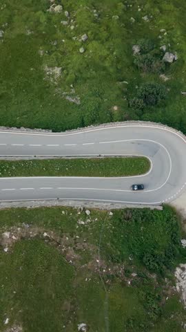 Furkapass Switzerland showcases stunning mountain roads winding through lush landscapes. Experience the beauty of this iconic location ideal for travel and adventure in the heart of the Swiss Alps.