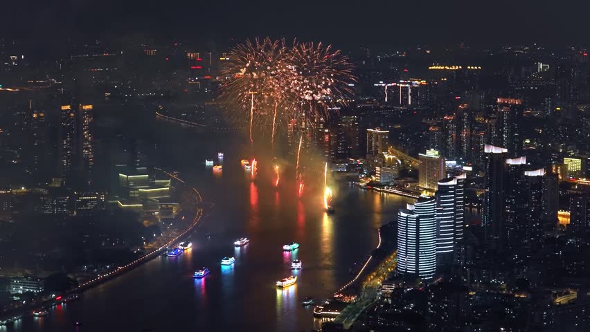 Aerial top drone view grand multi-colored fireworks display night sky over modern city. Beautiful gorgeous firecracker background. People celebrate holiday. New Year festival party. Pyrotechnics show.