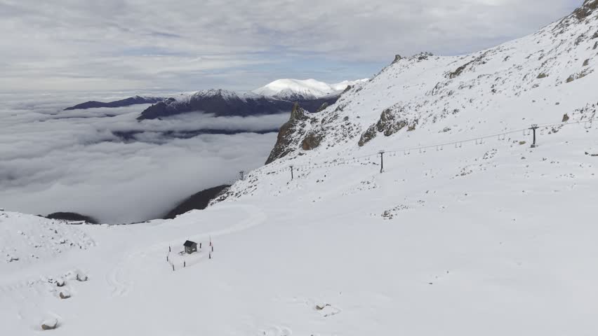 snow-capped mountains, 2,000 meters above sea level