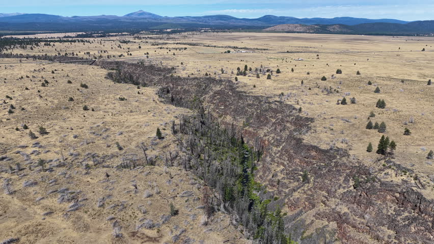 Over millennia Mill Creek has carved a 230-foot deep canyon on the Central Oregon plateau between Bend and Portland. This scenic area of high desert is part of the Warm Springs reservation.