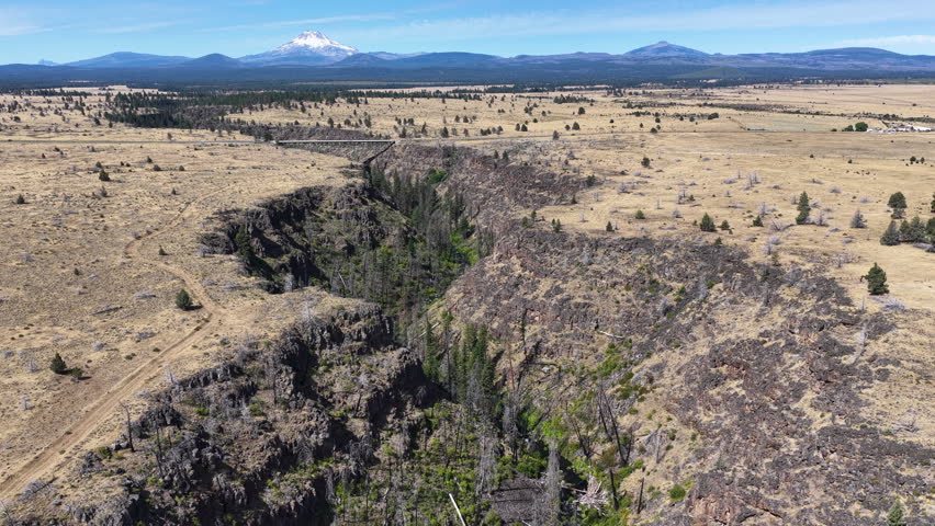 Over millennia Mill Creek has carved a 230-foot deep canyon on the Central Oregon plateau between Bend and Portland. This rugged yet scenic area of high desert is part of the Warm Springs reservation.