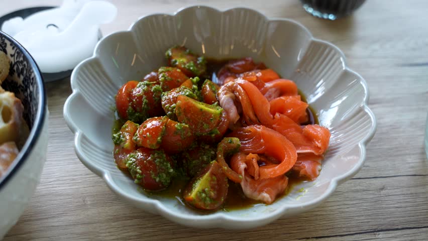 Gourmet sashimi made with rainbow trout and tomato pesto