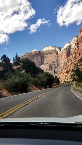 Scenic panoramic view of the Grand Canyon West Rim in Arizona, USA. Desert landscape with layered red rock cliffs, deep canyon formations, Colorado River view. A road trip near Eagle and Guano Point