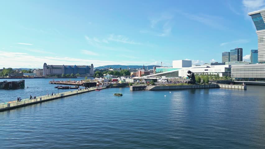 Aerial view of the iconic Oslo Opera House with its white marble roof and modern architecture situated along the vibrant waterfront in Oslo, Oslo, Norway.