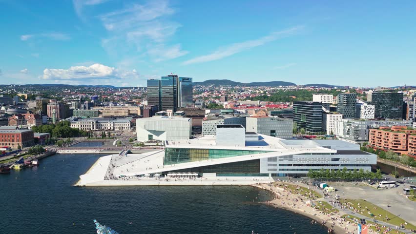 Aerial view of the iconic Oslo Opera House with its white marble roof and glass facade situated on the waterfront in Oslo, Oslo, Norway.