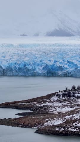 Perito Moreno Glacial At El Calafate In Santa Cruz Argentina. Stunning Glacier. Los Glaciares National Park. Iceberg Background. Perito Moreno Glacial At El Calafate In Santa Cruz Argentina.
