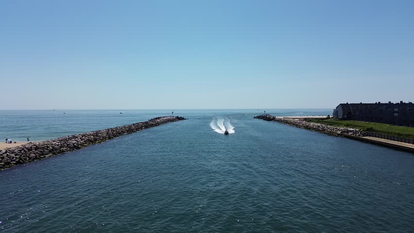 Point Pleasant inlet boat coming in.
