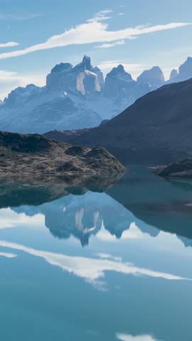 Grey Lake At Torres Del Paine In Antarctica Chile. Snowy Mountains. Lake Landscape. Antarctica Chile. Winter Background. Grey Lake At Torres Del Paine In Antarctica Chile.