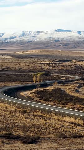Patagonia Argentina. Famous road at town of El Calafate at Patagonia Argentina. Patagonia road landscape. Amazing landscape of desert scenery with nevada mountain. El Calafate at Patagonia Argentina