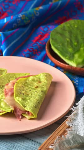Traditional Mexican food. Fresh nopal cactus leaves, green quesadillas and green nopal tortillas