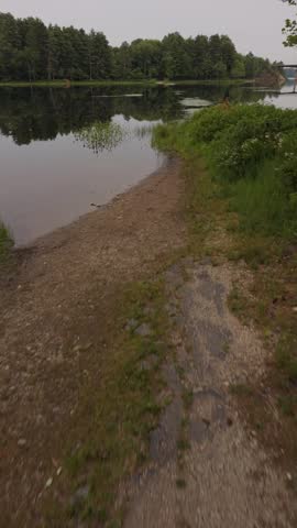9 x 16 Vertical crossing of the now flooded Little Frost Road in Hopkinton, NH on a hot summer evening 