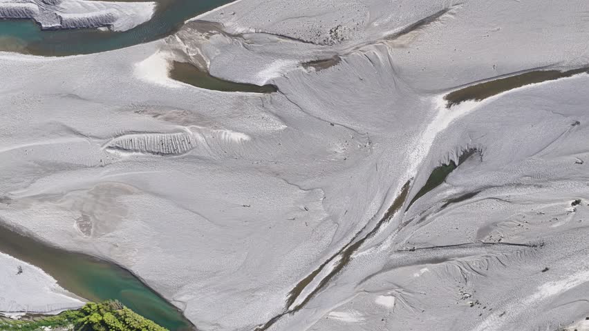 A closer look at the braided Rakaia River with its branching streams.
Multiple river channels create a unique natural pattern when viewed from above.