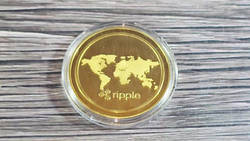 Reverse of Physical Ripple XRP, the native cryptocurrency of the XRP Ledger (XRPL), an open-source, decentralized blockchain technology, designed to facilitate fast cross-border payments