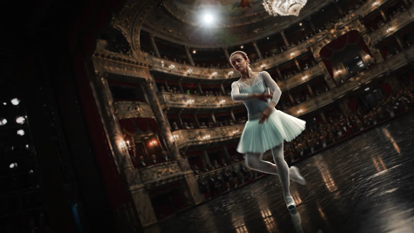 Prima Ballerina in a Delicate Tutu Captivates a Packed Opera House With Poised Arabesque Poses, Filmed in Stunning 1000fps Super Slow Motion as the Cinematic Camera Circles Her Graceful Artistry.