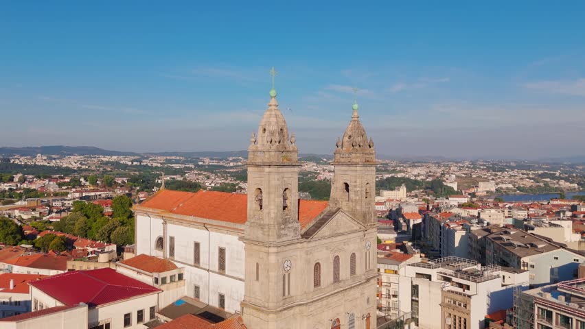 Orbiting shot of Igreja do Bonfim with surrounding cityscape in Porto, Portugal.