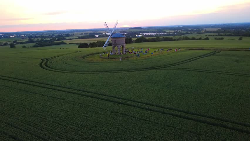 Drone footage of Chesterton Windmill at dusk with soft evening colours across the Warwickshire countryside.