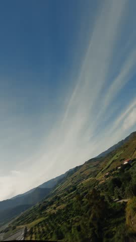 Aerial view of riverbed and hills landscape