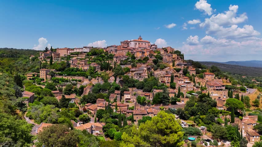 Aerial drone view Gordes commune on top of a hill. Provence-Alpes-Cote d