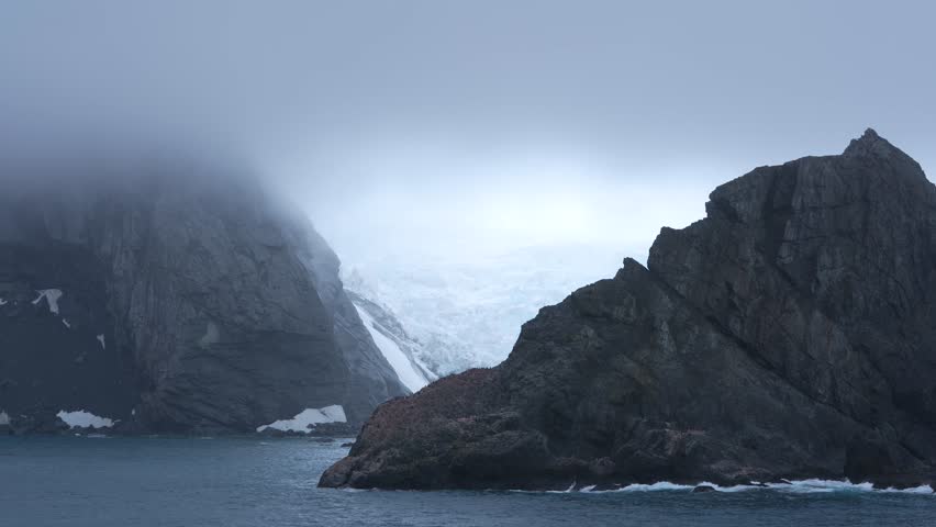 Antarctica Point Wild on Elephant Island View From Cruise Ship. Moody Mist Background. Rock Formation Mountain Adventure Travel Mist