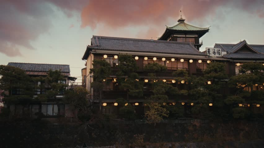 Sunset shot of the Tōkaikan (東海館), a historic 1928 ryokan on the Matsukawa River, Ito, Shizuoka, Japan.