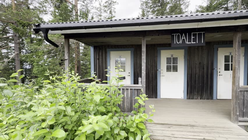 Public restroom and water refill station at the top of Skuleberget mountain in Sweden, serving hikers and visitors.