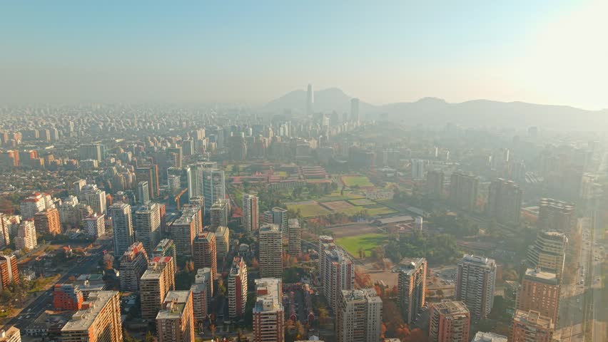 Panoramic aerial view of Santiago, Chile, with a light mist, and the Bernardo O