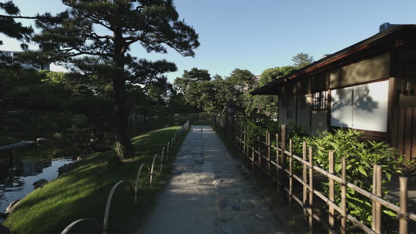 Walk beside Takuei Pond at Shukkeien Garden, Hiroshima