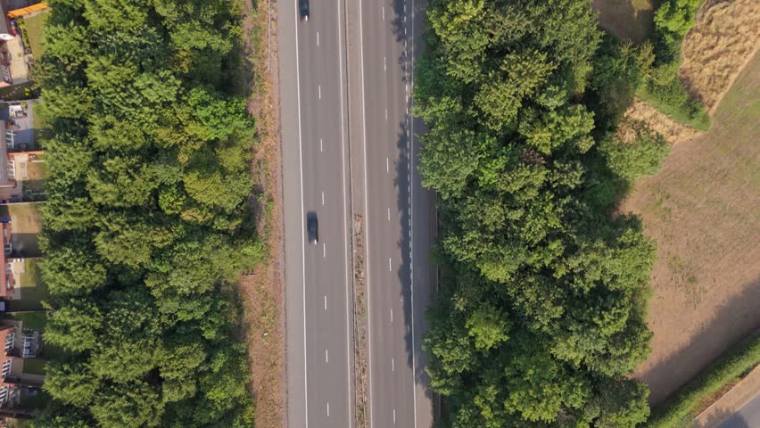 An aerial view looking straight down following the traffic direction on the M54 motorway in Telford, UK