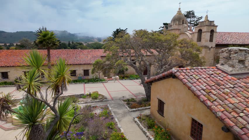 Explore the grounds of the historic Mission church in Carmel California. Gardens and buildings show culture and history.