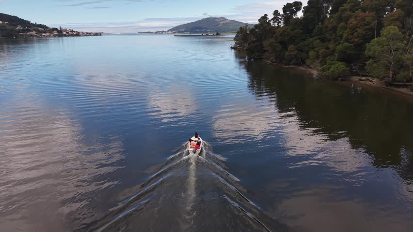 Rio miño river emptying into the atlantic ocean, forming an estuary separating spain and portugal