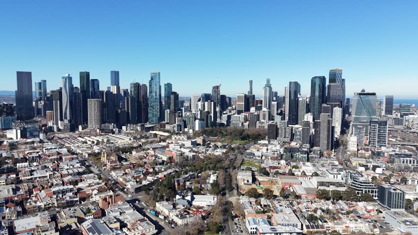 Expansive aerial panorama of the Melbourne central business district and surrounding suburbs