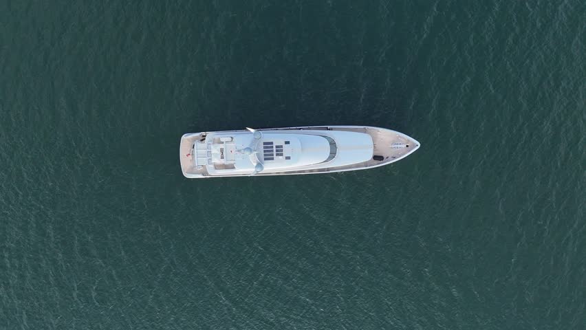 Luxury superyacht "Bella Vita" cruising through Kingston Harbour on Lake Ontario, Canada.