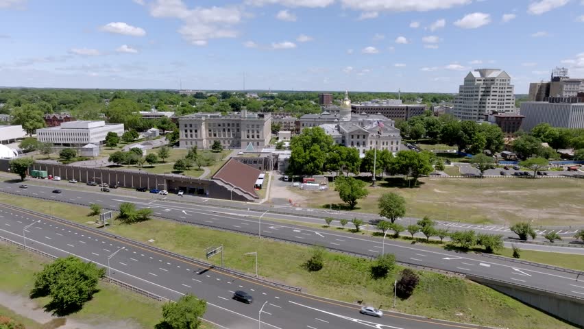 New Jersey state capitol building in Trenton, New Jersey with drone video moving in a circle wide.